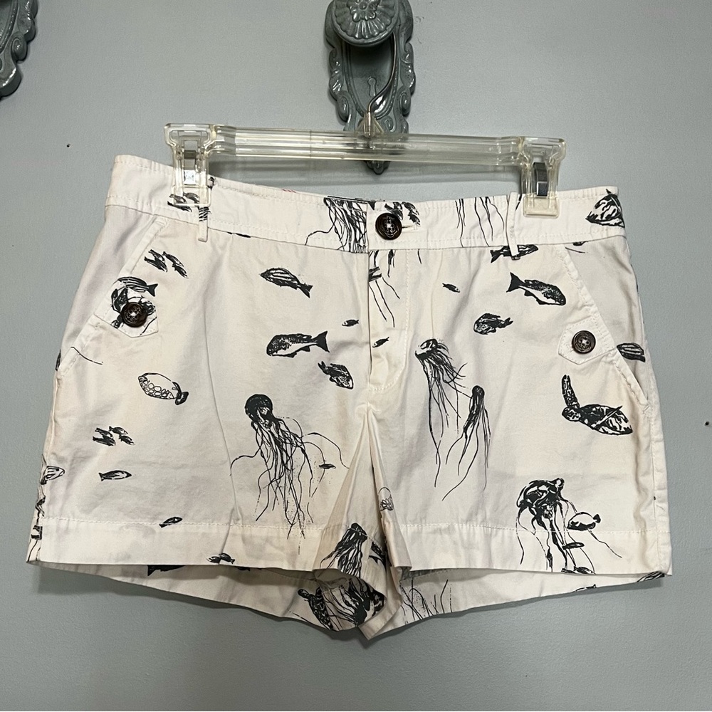 Daughters of Liberation 6 white blue shorts